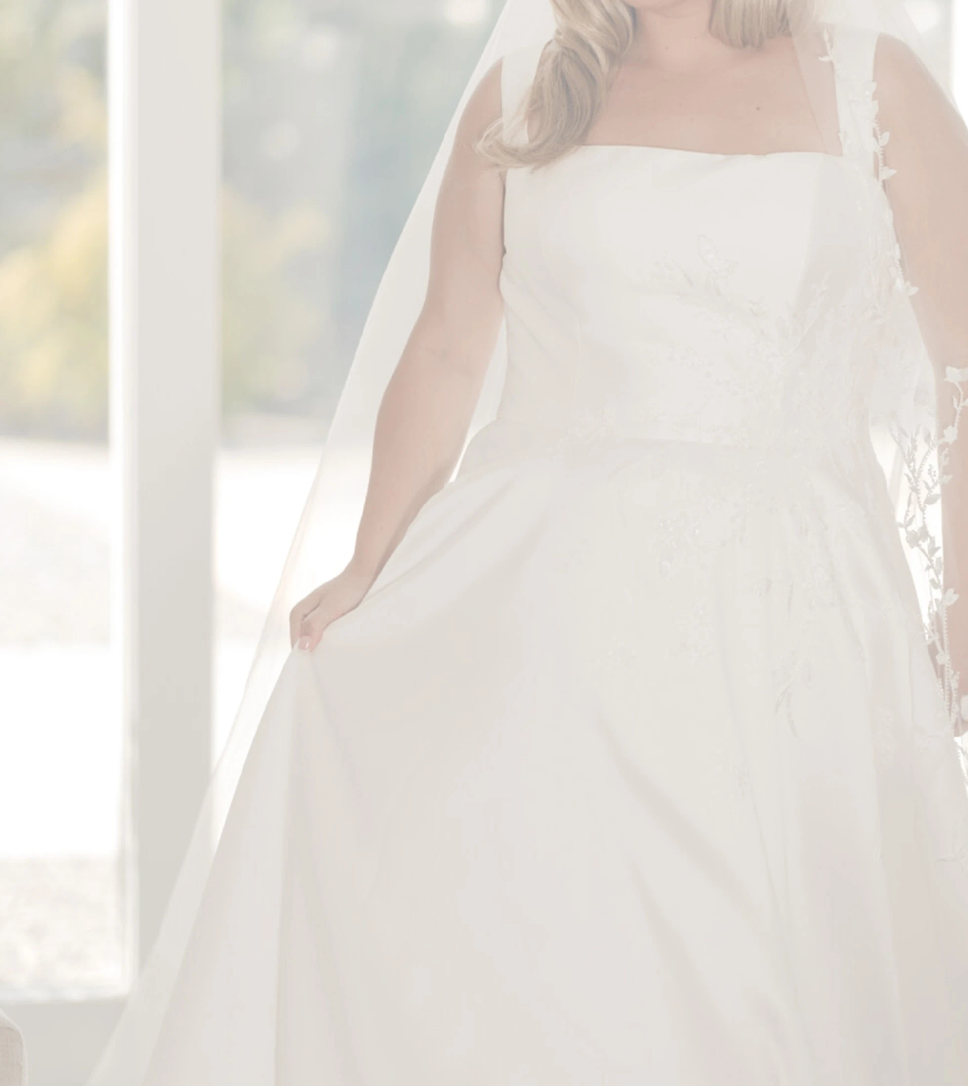 Model wearing a white white gown. Grayscale image